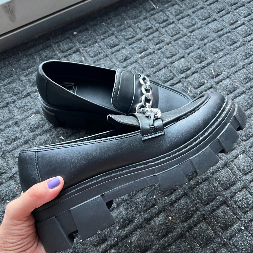 Black platform loafers